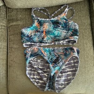 VGUC athleta, two piece reversible swimsuit for girls size XL